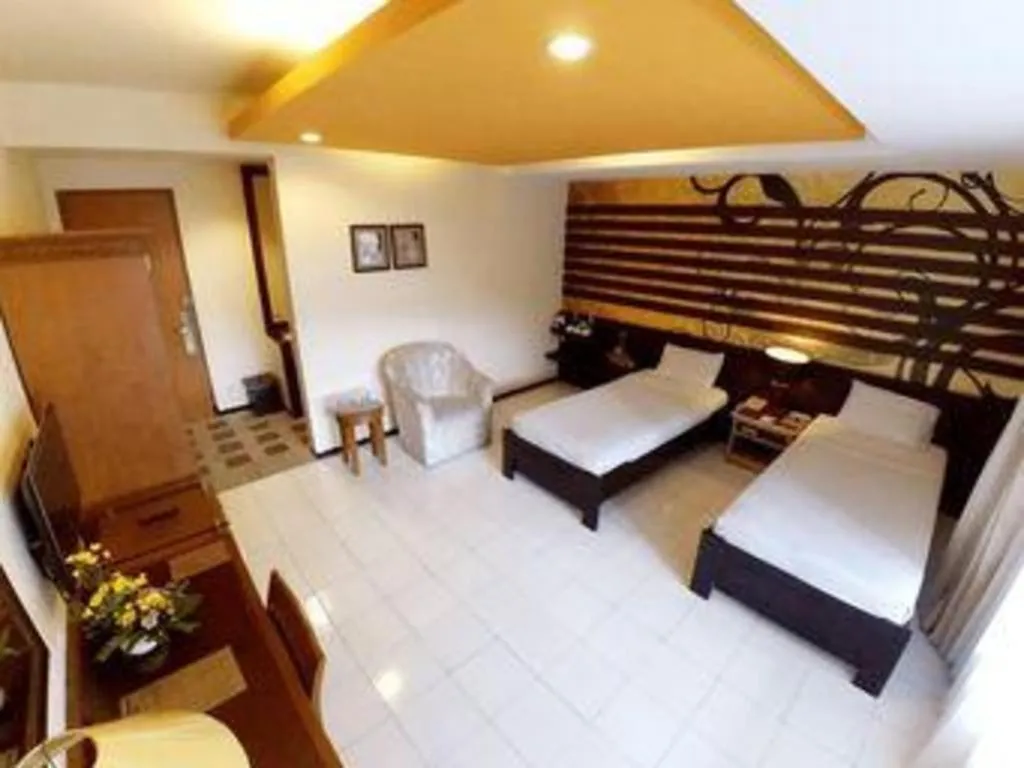 Bed in Purnama Hotel