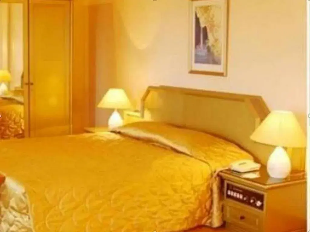 Bed in Purnama Hotel Bed in Purnama Hotel