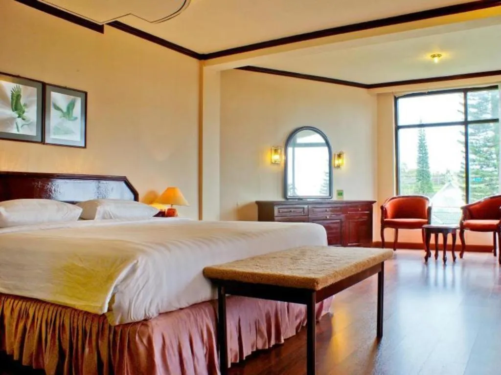 Bed in Purnama Hotel