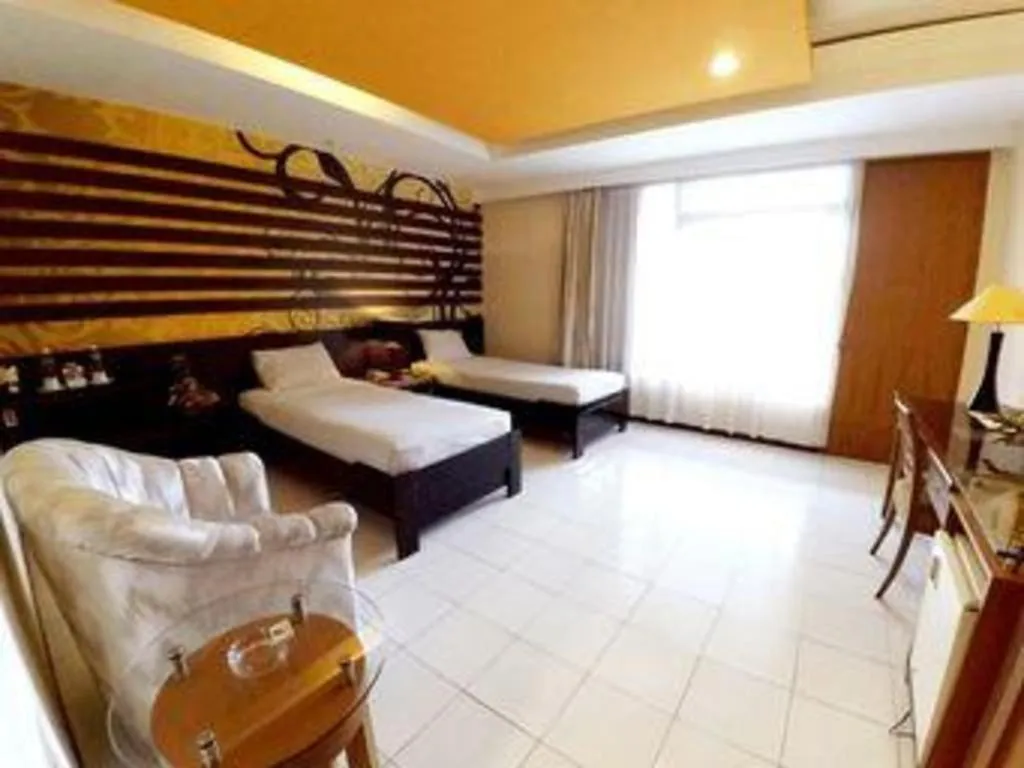 Bed in Purnama Hotel