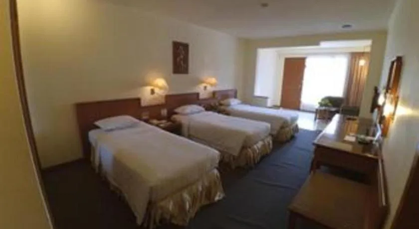 Bed in Purnama Hotel