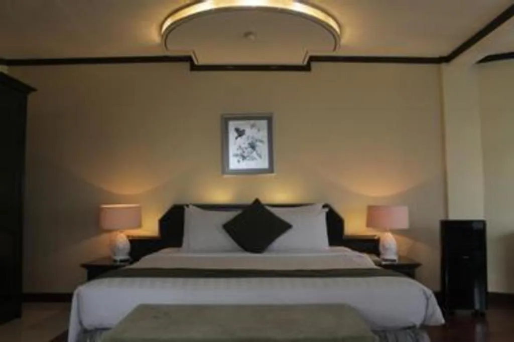 Bed in Purnama Hotel