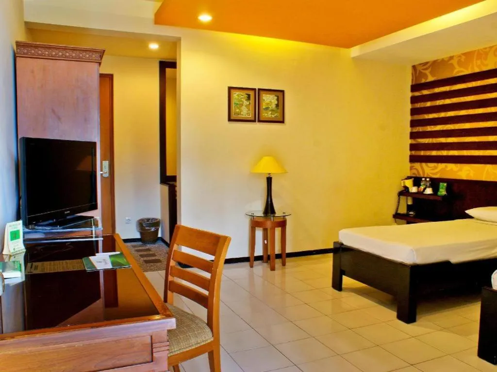 Bed in Purnama Hotel