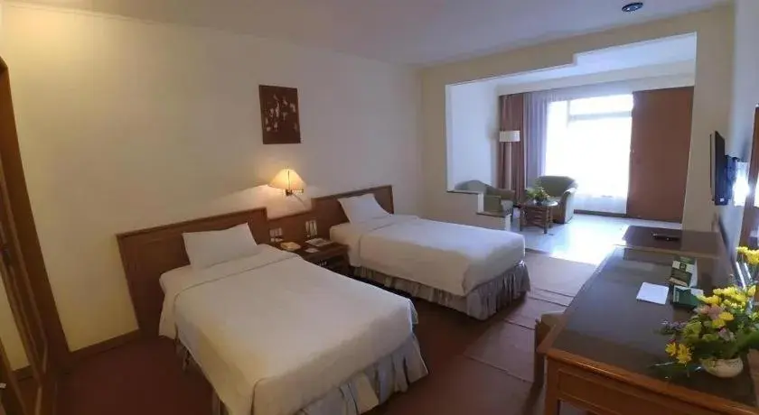 Bed in Purnama Hotel Bed in Purnama Hotel