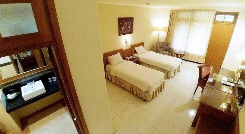 Bed in Purnama Hotel