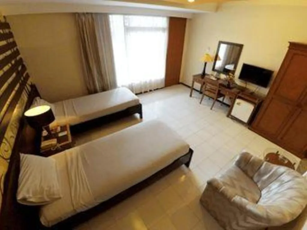 Bed in Purnama Hotel