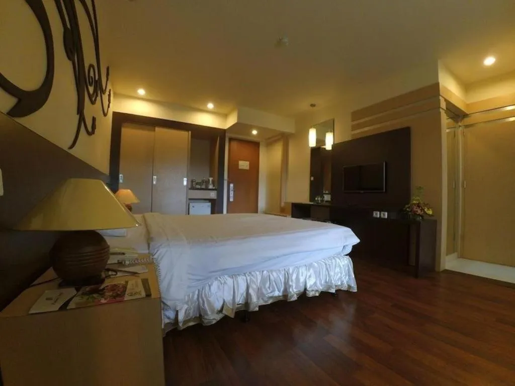 Bed in Purnama Hotel