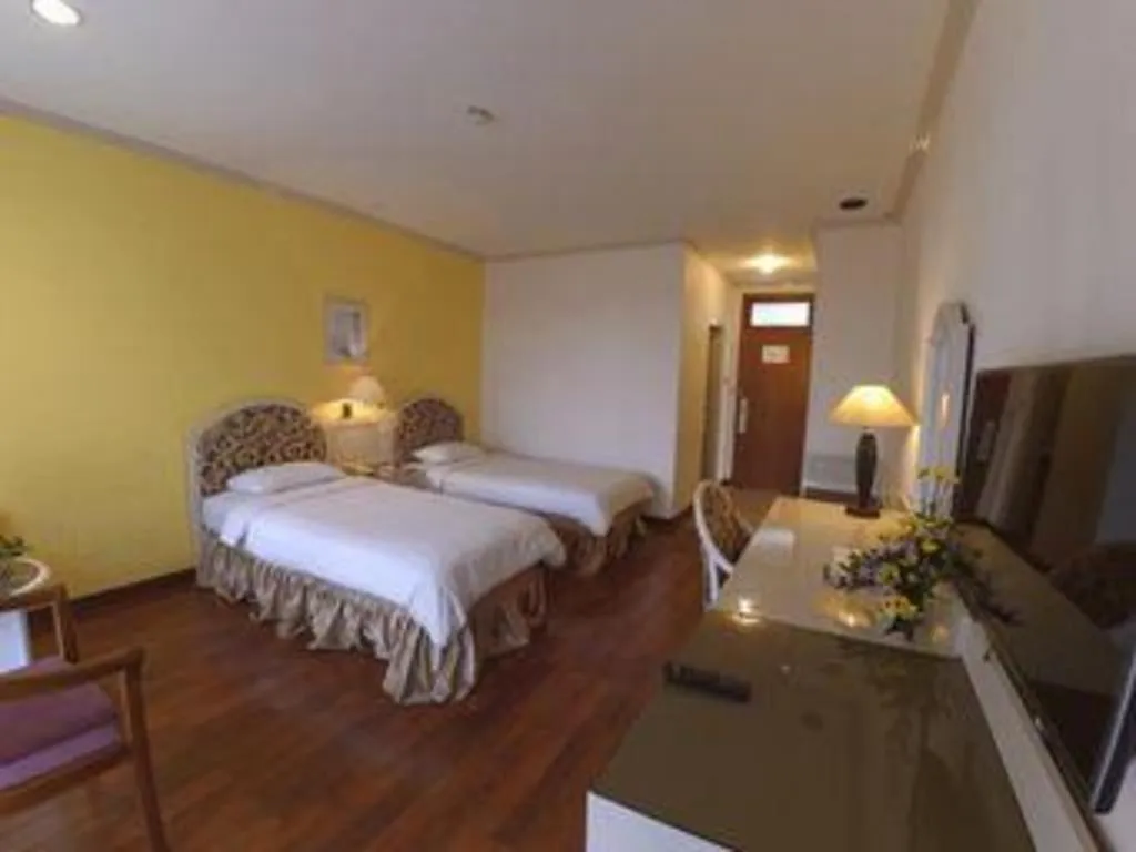 Bed in Purnama Hotel