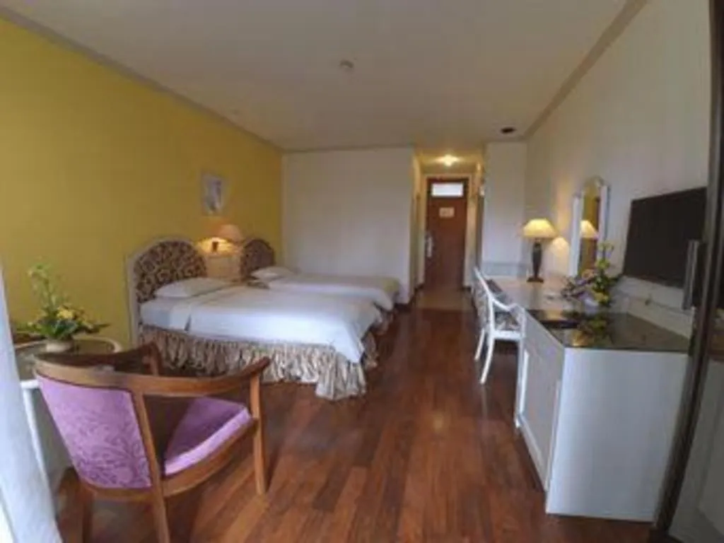 Bed in Purnama Hotel