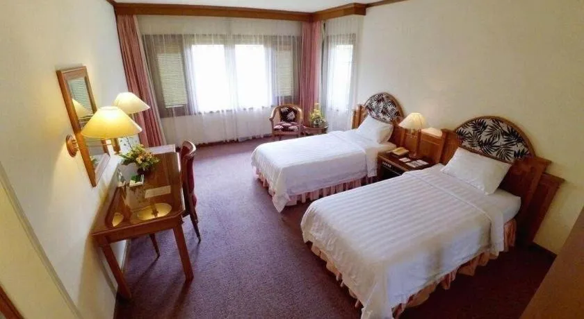 Bed in Purnama Hotel