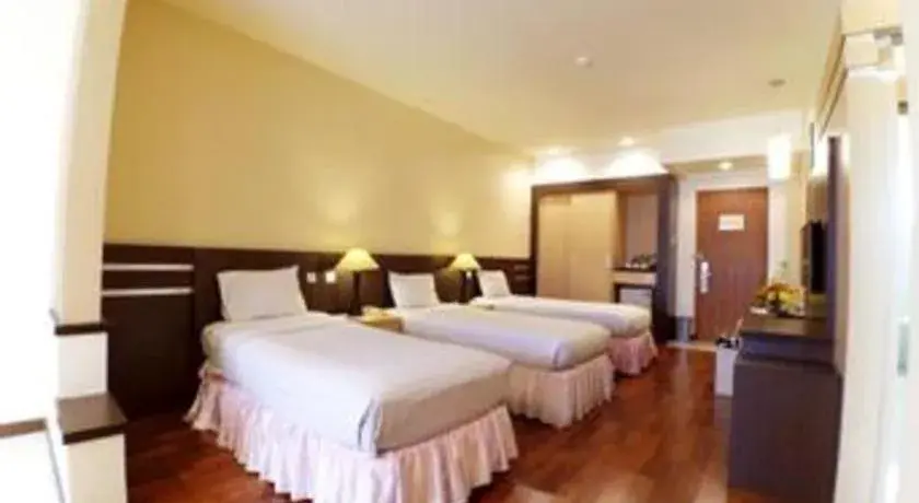 Bed in Purnama Hotel Bed in Purnama Hotel