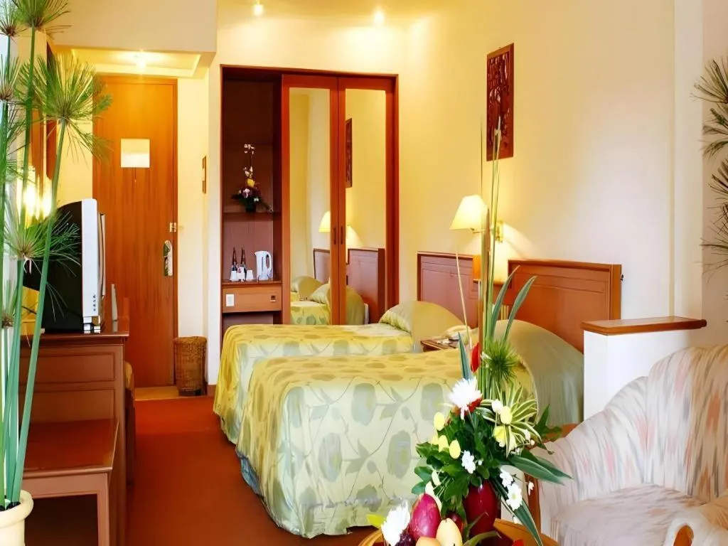 Bed in Purnama Hotel