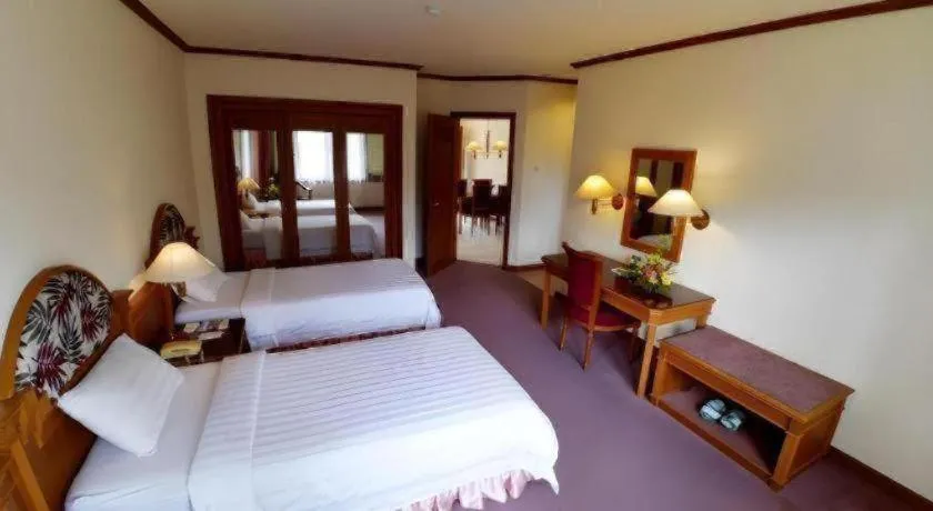 Bed in Purnama Hotel