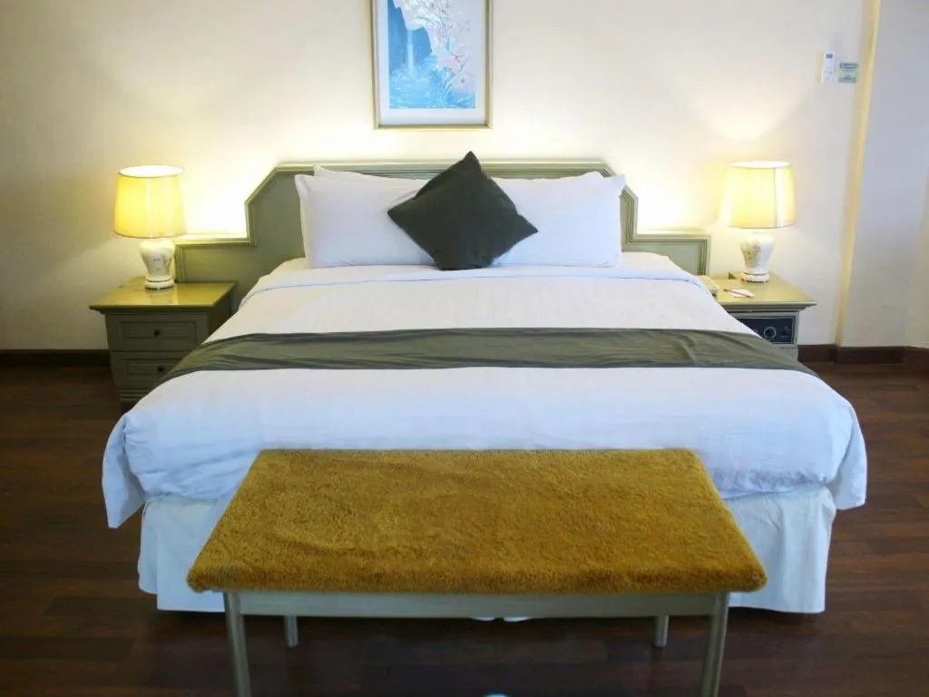 Bed in Purnama Hotel