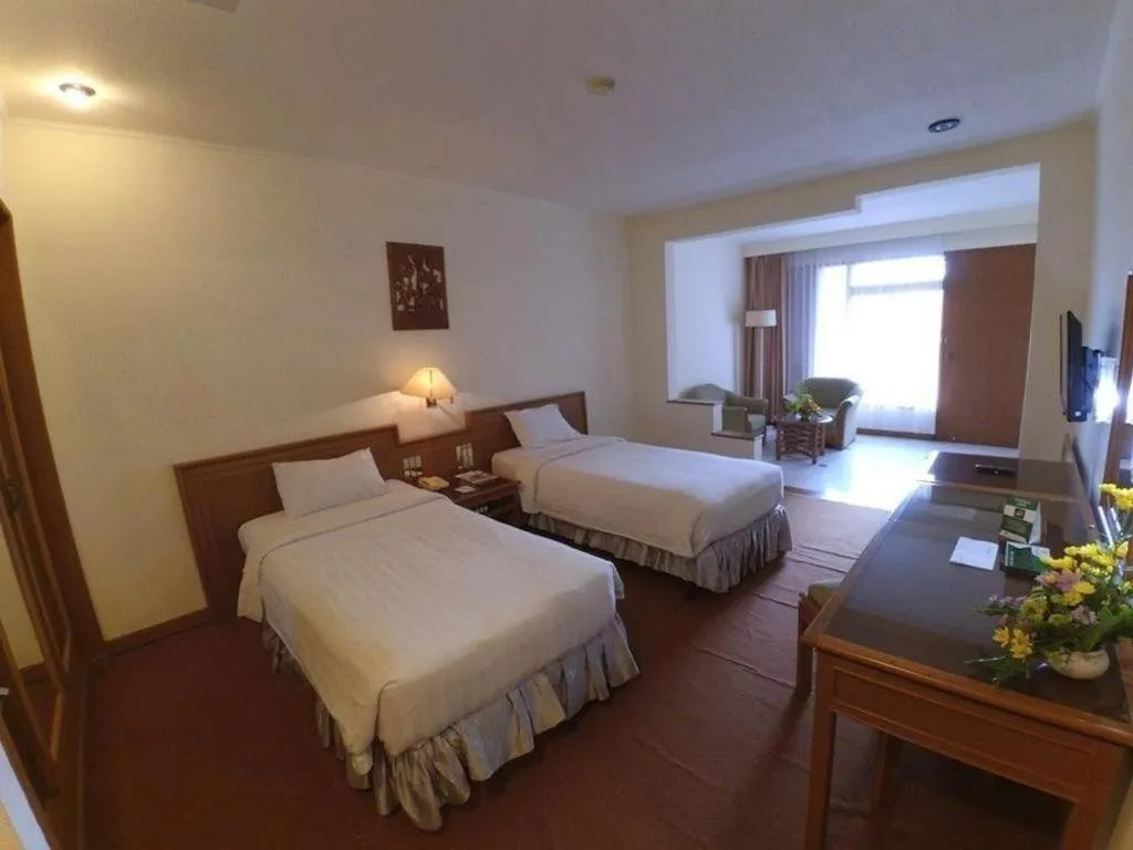 Bed in Purnama Hotel