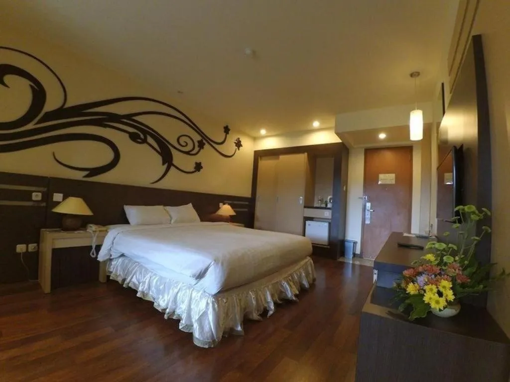 Bed in Purnama Hotel