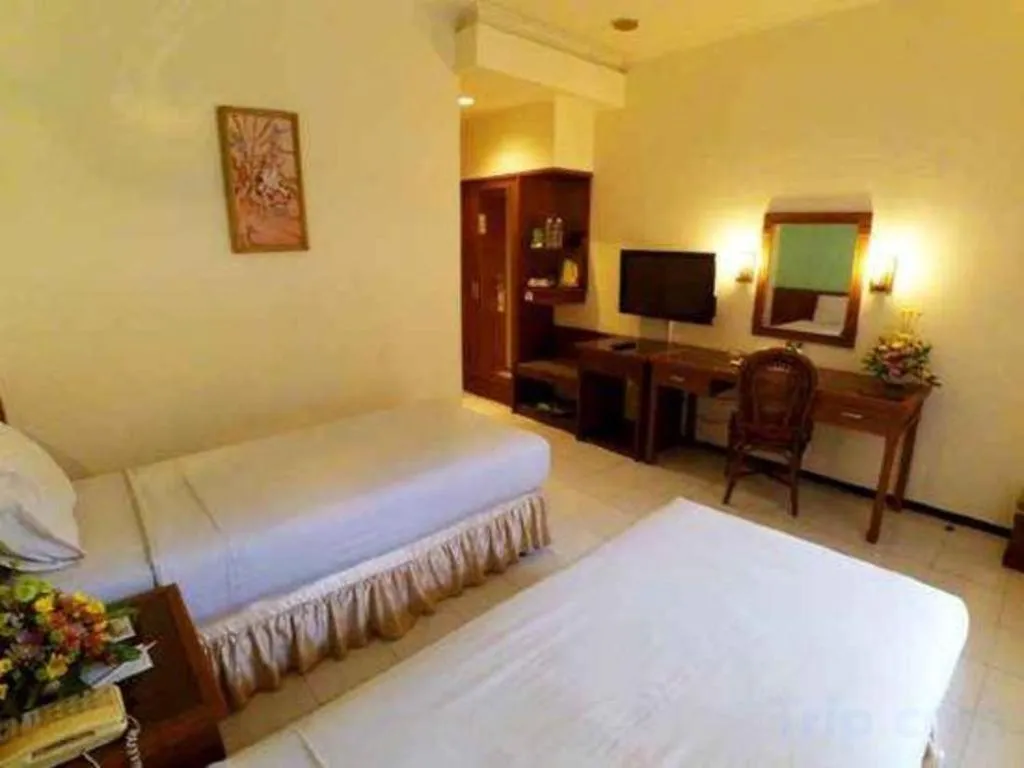 Bed in Purnama Hotel