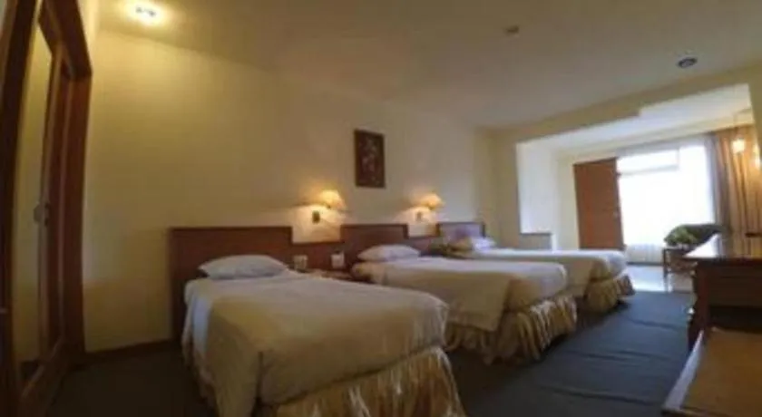 Bed in Purnama Hotel
