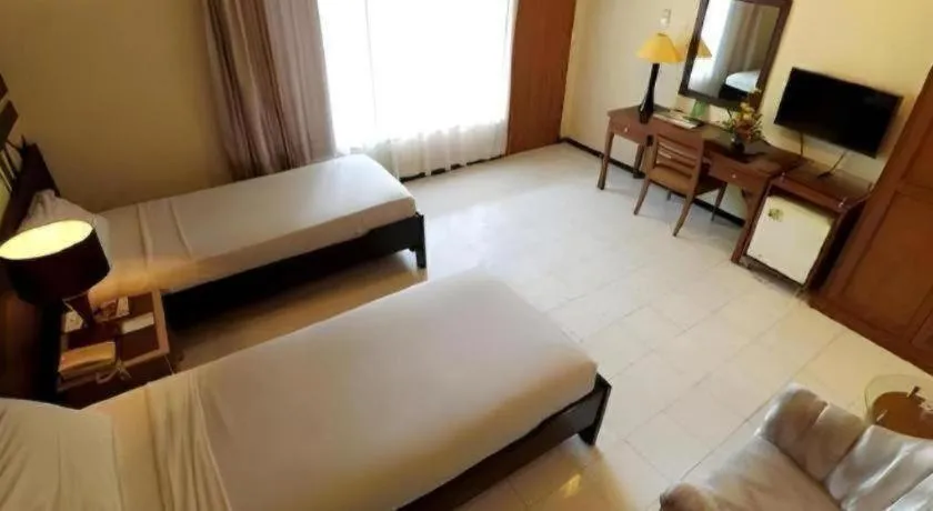 Bed in Purnama Hotel