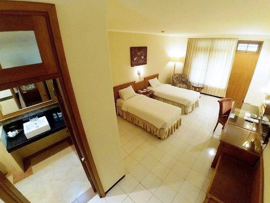 Bed in Purnama Hotel