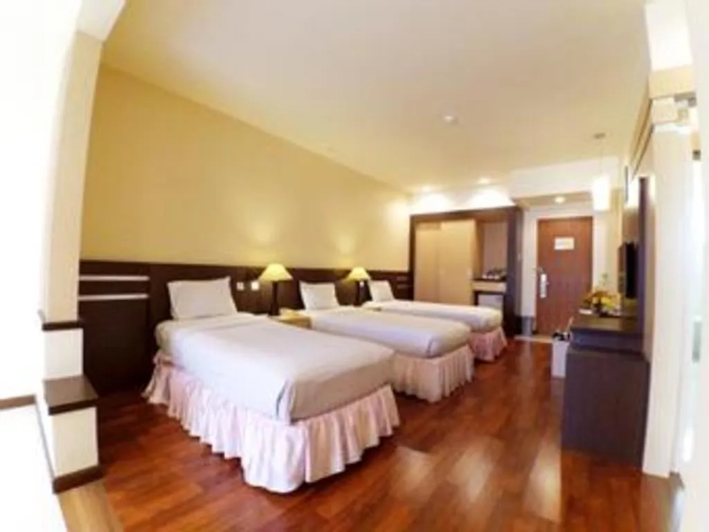 Bed in Purnama Hotel