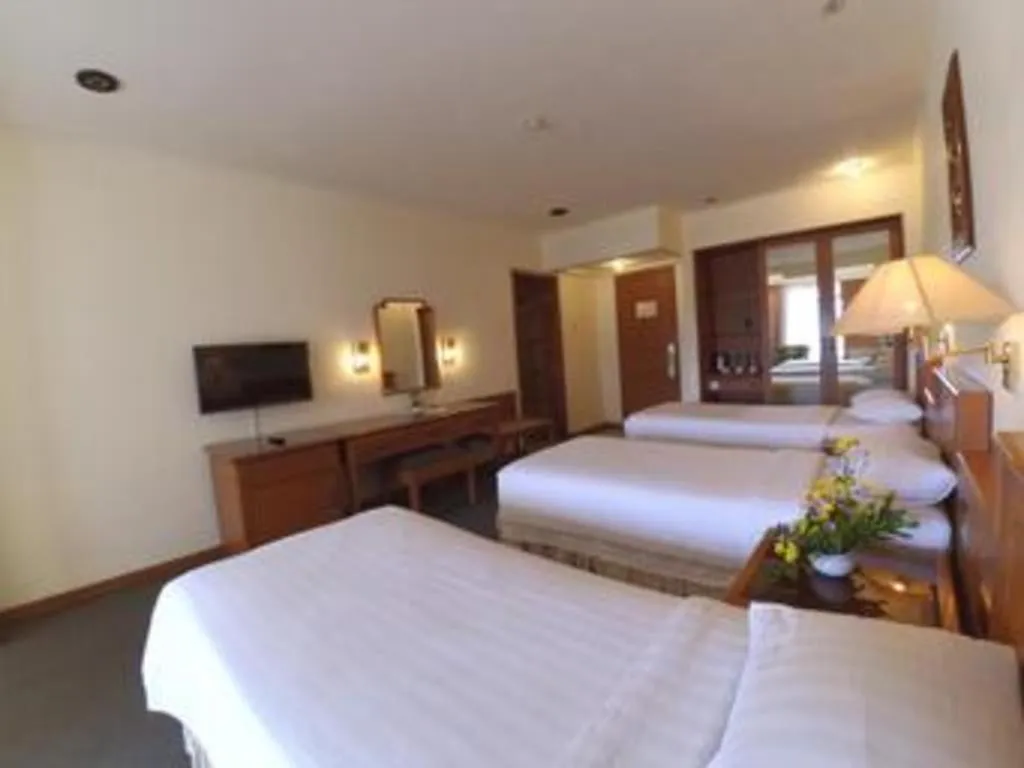 Bed in Purnama Hotel