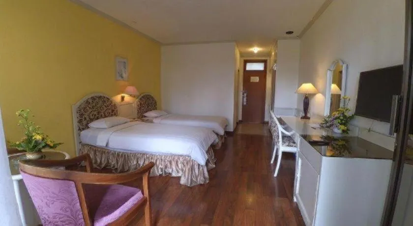 Bed in Purnama Hotel