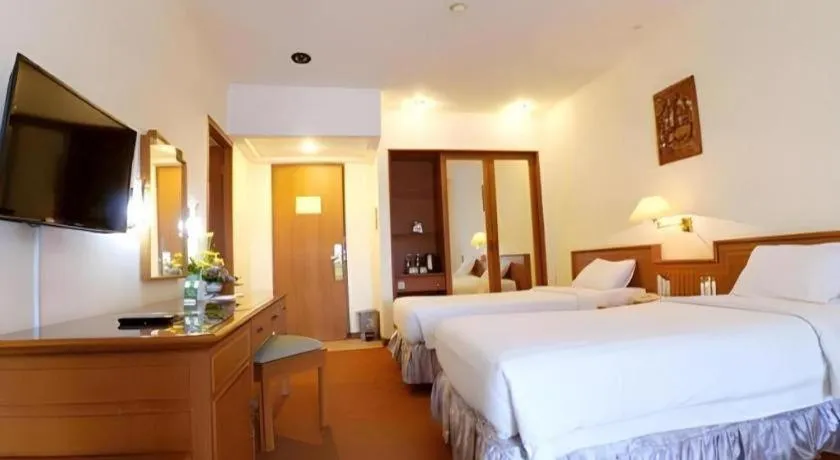 Bed in Purnama Hotel