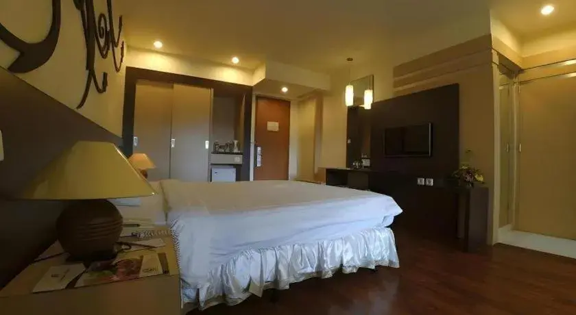Bed in Purnama Hotel Bed in Purnama Hotel