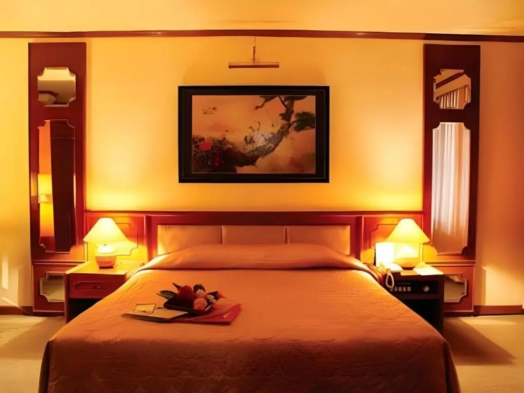 Bed in Purnama Hotel