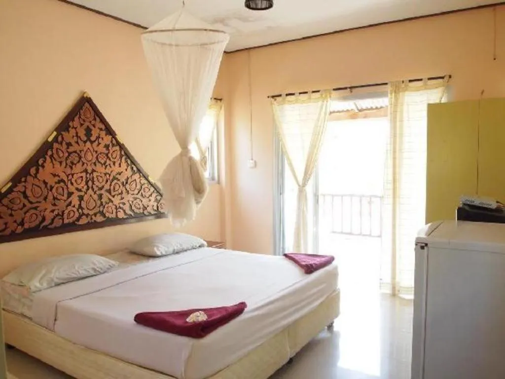 Bed in Jinta Beach Bungalow