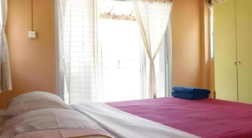 Bed in Jinta Beach Bungalow