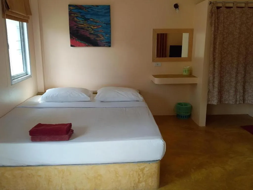 Bed in Jinta Beach Bungalow