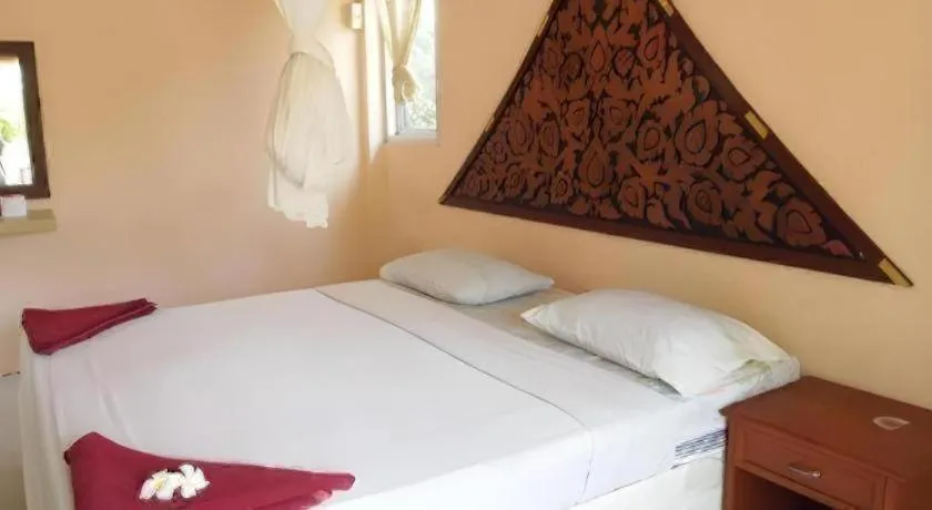 Bed in Jinta Beach Bungalow