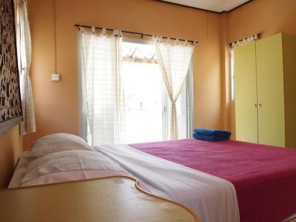Bed in Jinta Beach Bungalow