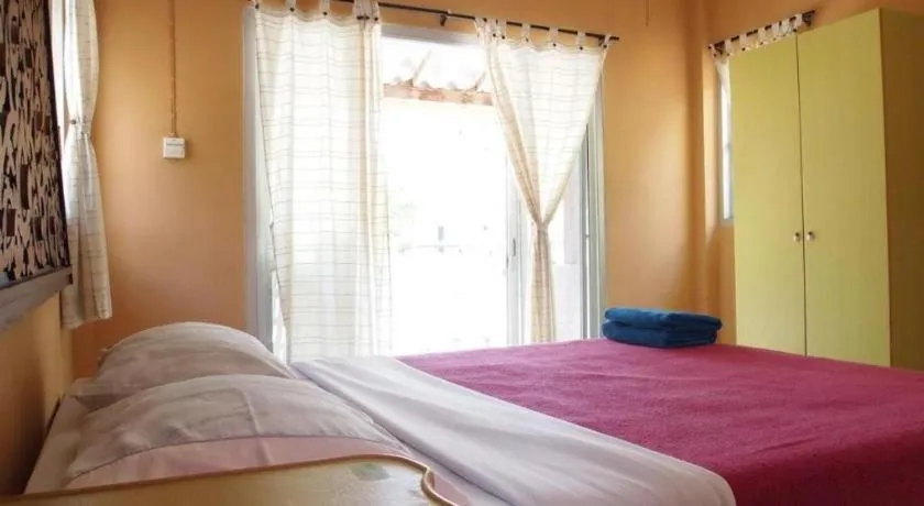 Bed in Jinta Beach Bungalow