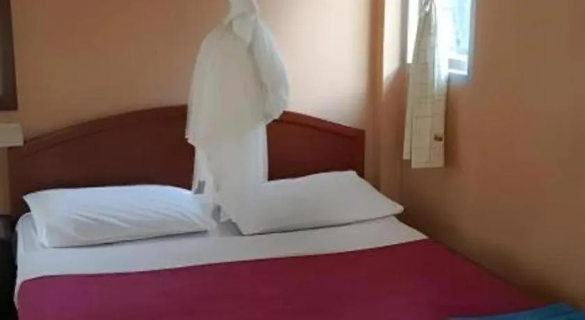 Bed in Jinta Beach Bungalow