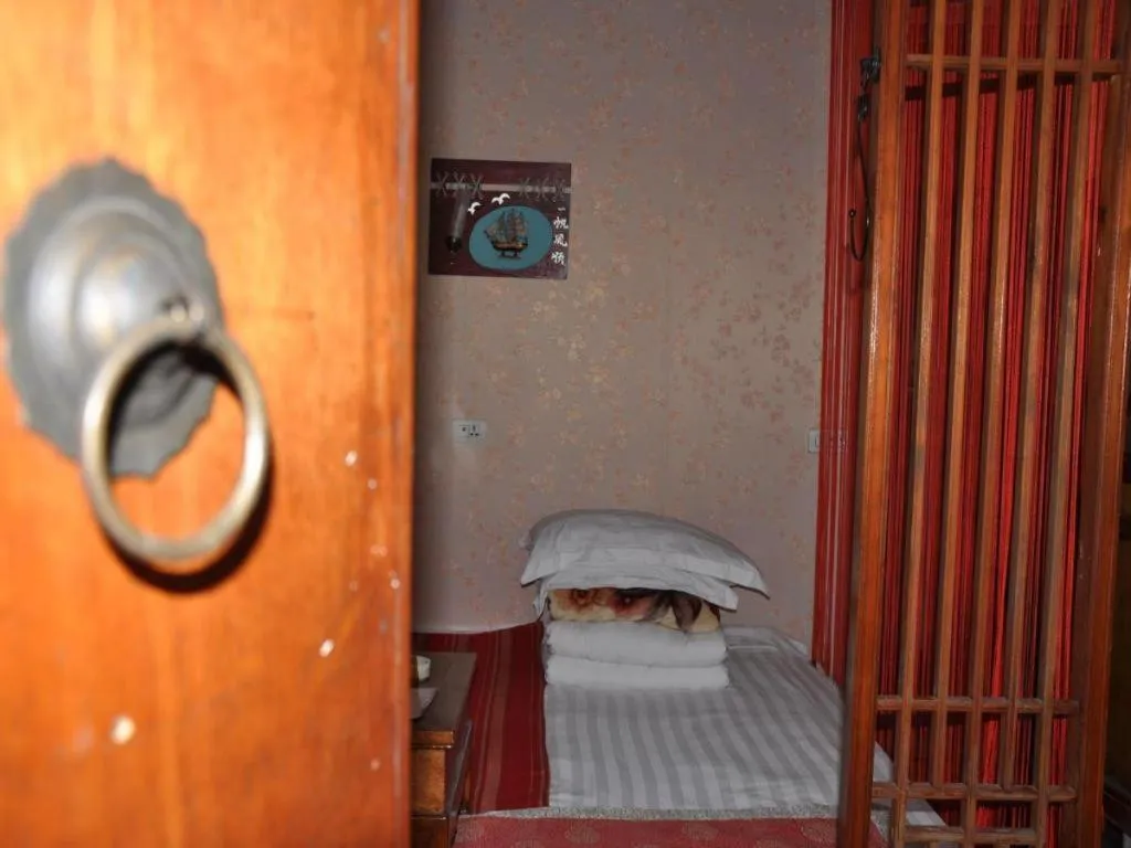 Bed in Pingyao Yufengheng Hotel