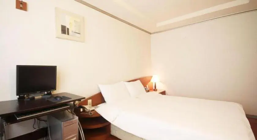 Bed in Mirabell Motel Bed in Mirabell Motel