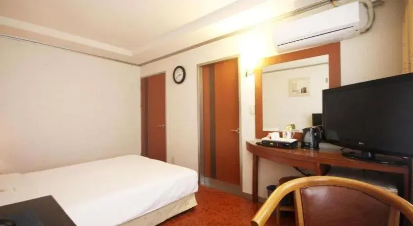 Bed in Mirabell Motel Bed in Mirabell Motel