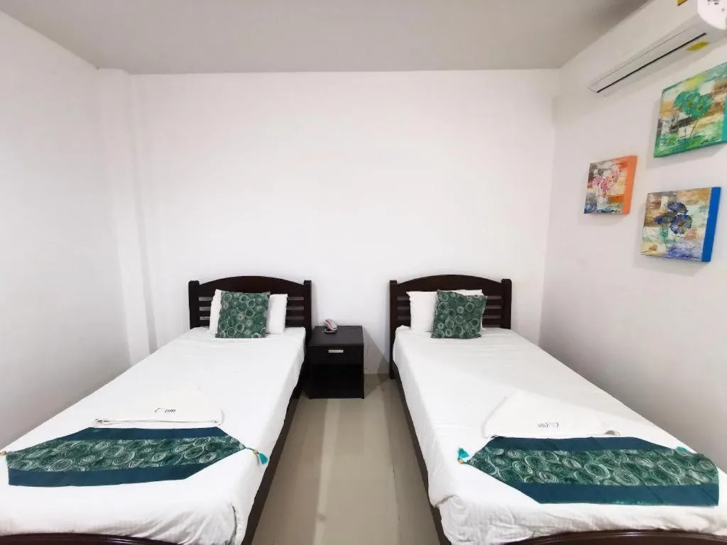 Bed in Phet Cha-am Plaza&Resort