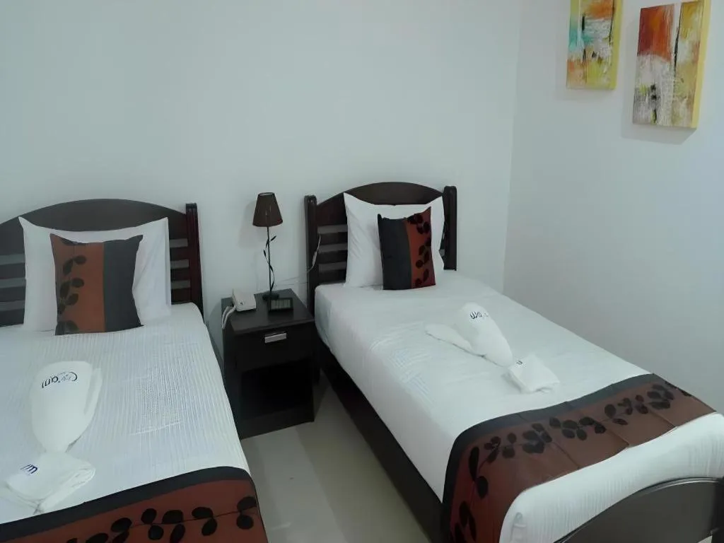 Bed in Phet Cha-am Plaza&Resort