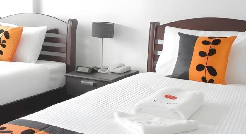 Bed in Phet Cha-am Plaza&Resort