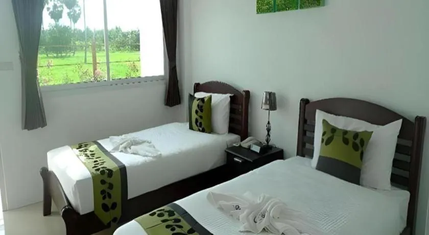 Bed in Phet Cha-am Plaza&Resort