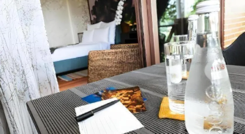 Bed in Baan Souchada Resort & Spa