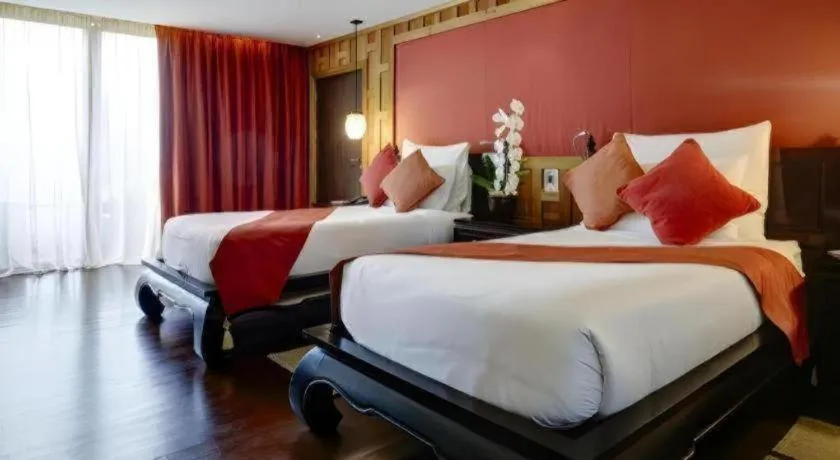 Bed in Baan Souchada Resort & Spa