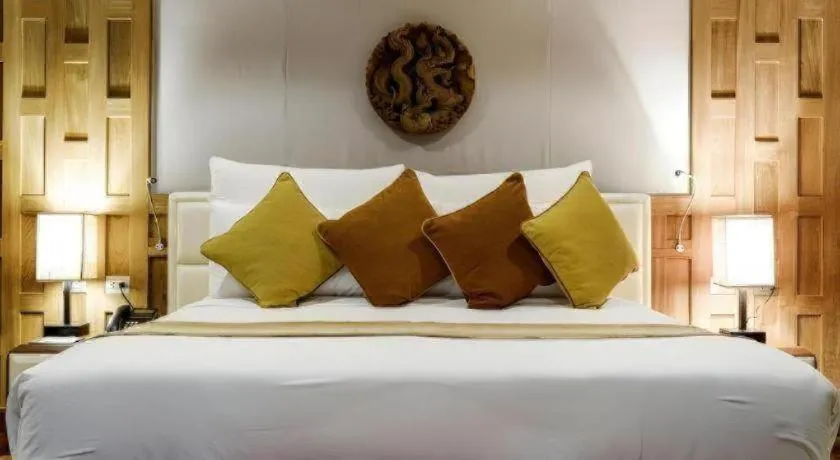 Bed in Baan Souchada Resort & Spa