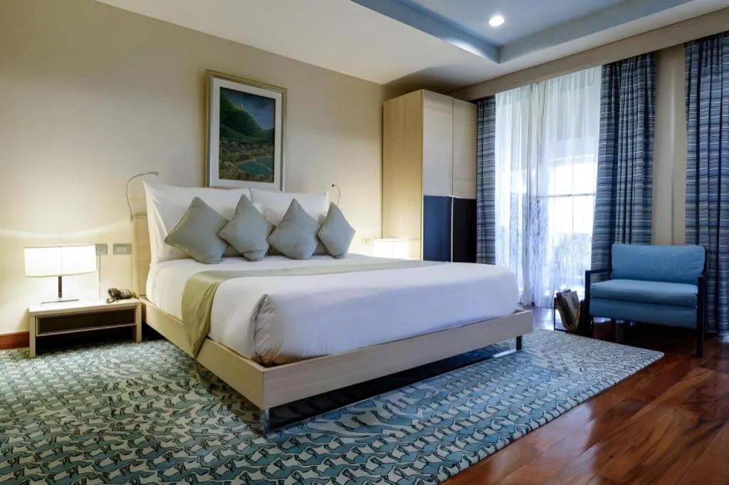 Bed in Baan Souchada Resort & Spa