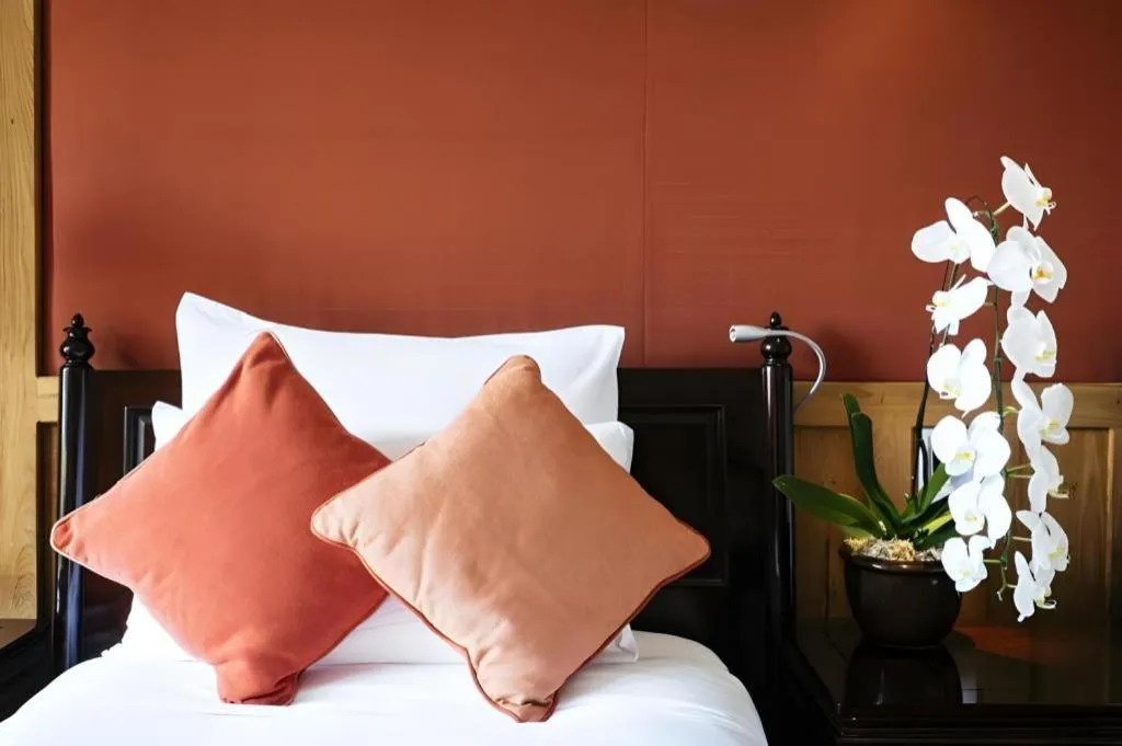 Bed in Baan Souchada Resort & Spa