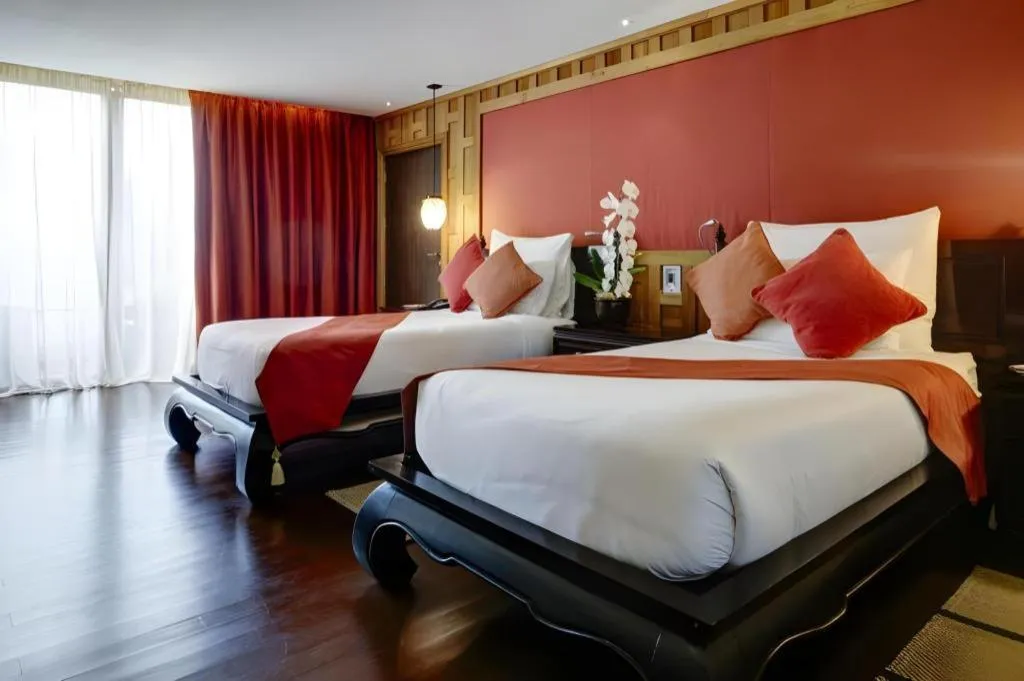 Bed in Baan Souchada Resort & Spa